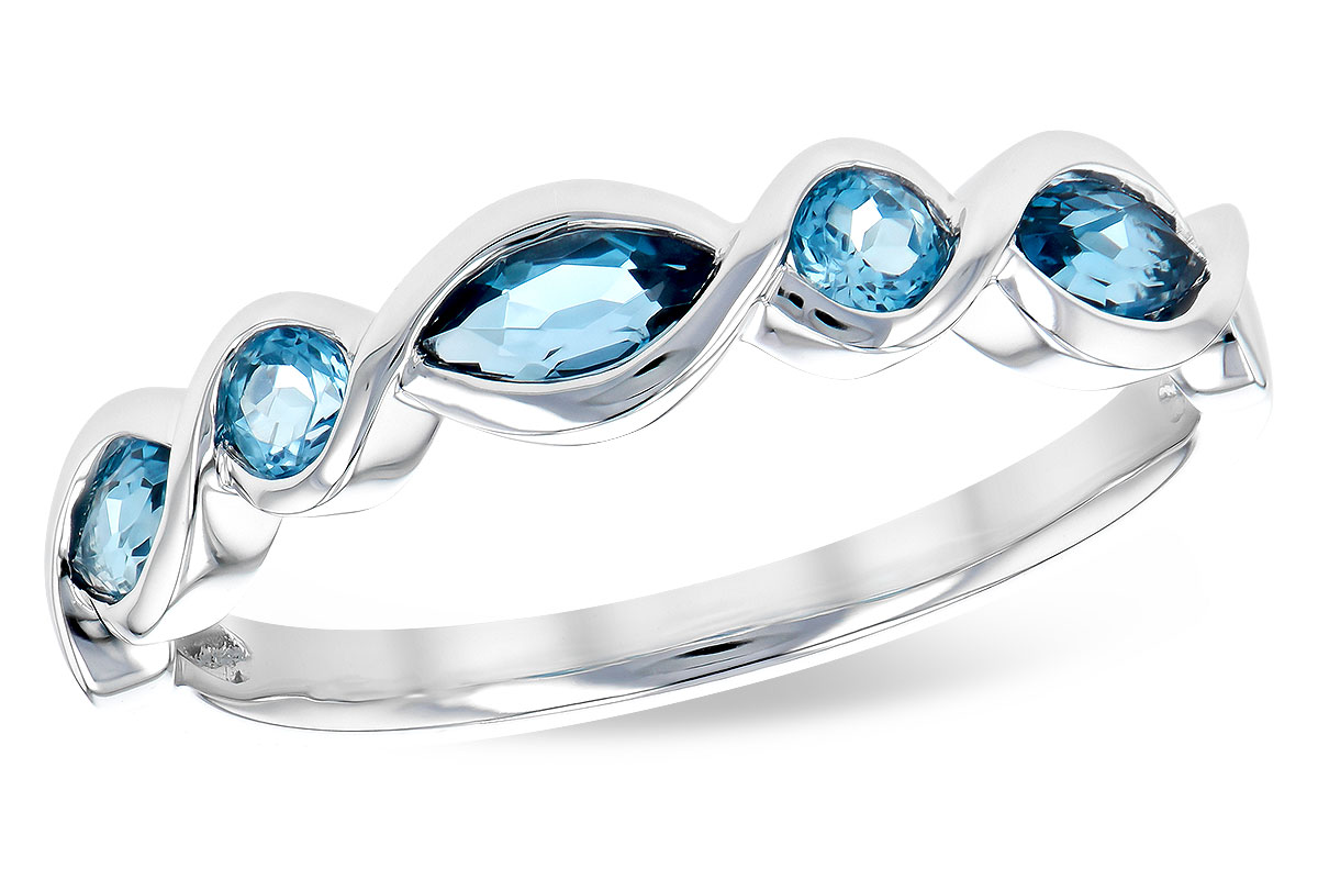 E309-48957: LDS RG .60 TW BLUE TOPAZ